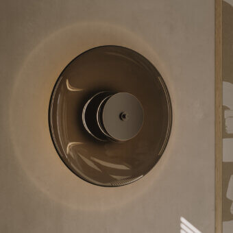 Distinguished VENICEM Zen lamp presenting circular silhouettes with muted amber Murano glass and burnished brass structure