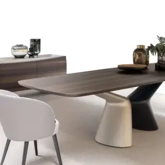 Distinguished Presotto Victor table with a large rounded dark brown tabletop and contoured legs in matte silver and dark hues