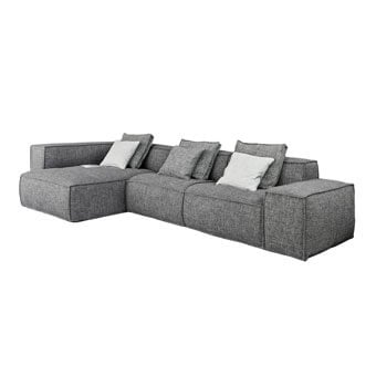 Gray modular sectional sofa with textured weave, L-shape chaise, and relaxed cushions, styled with gray and cream throw pillows.