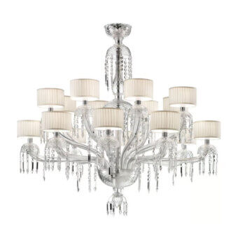 Murano chandelier, silver-toned metal, cascading crystals, sixteen lamps with cream fabric shades, ornate branching structure, studio shot.