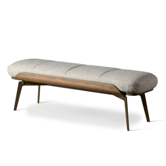 Bench, light gray quilted fabric, curved seat with dark walnut wood frame and tapered bronze metal legs.