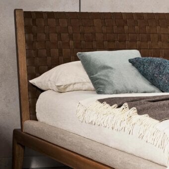 Superior Bonaldo Honeymoon bed with hand-applied woven full-grain leather headboard and curved solid wood structure