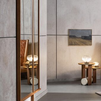 Distinguished Bonaldo Isola mirror with a moveable flag wing framed in medium-toned solid wood and vertical mirror panels