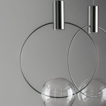 Exclusive Bonaldo Keshi suspension lamp with a transparent blown glass sphere and sleek silver metal structure with polished finish