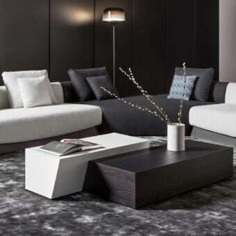 Exceptional Bonaldo Litos coffee table with dark-toned veneered wood and monolithic trapezoidal form
