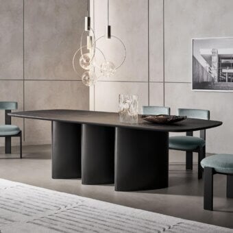 Distinguished Bonaldo Louver table with wooden construction, curved lines and dark matte finish creating sculptural legs