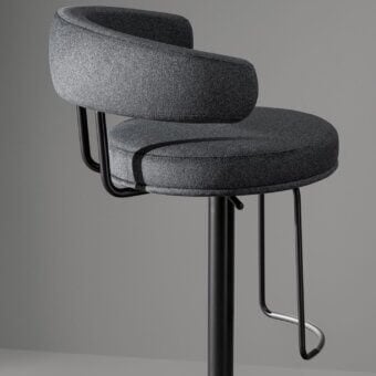 Distinguished Bonaldo Neuilly stool in textured gray fabric with a slender black metal frame and silver-toned metal footrest