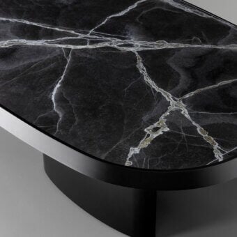 Distinctive Bonaldo Padiglioni table with marble top displaying white and gold veining and matte black metal base