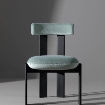 Harmonious Bonaldo Pi chair with rounded teal fabric cushion and dark-stained solid wood frame crafted in Italy