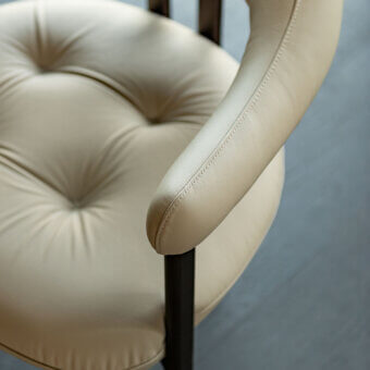 Exceptional Cattelan Italia Greta armchair with light beige synthetic upholstery and textured varnish metal legs