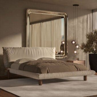 Distinguished Cattelan Italia Pascal bed with textured light beige fabric upholstery and brown leather straps