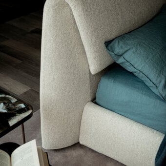 Exceptional Cattelan Italia Simon bed with light beige textured textile upholstery and gently curved headboard design