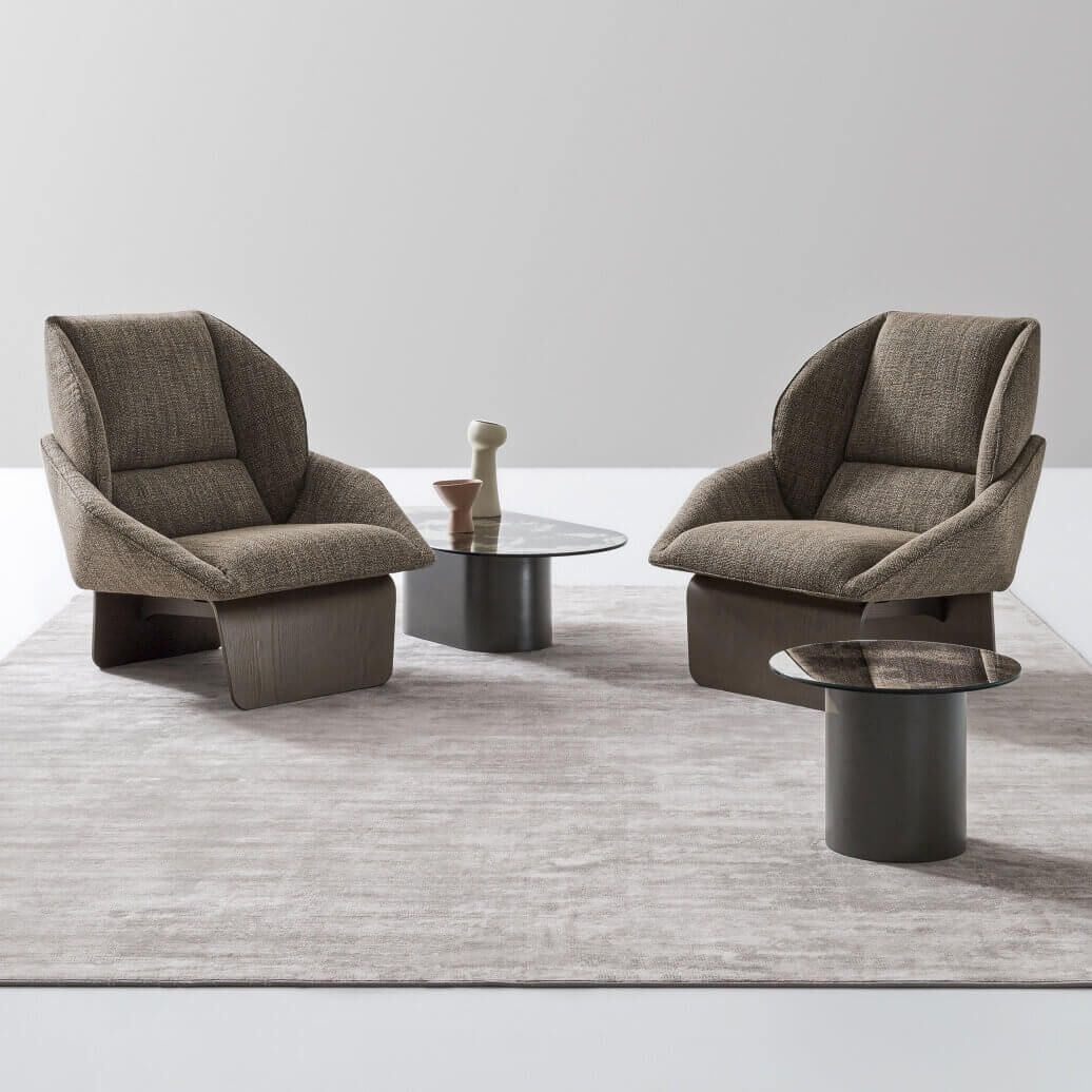 Distinctive Ditre Italia Loto lounge chair upholstered in textured brown textile with a dark brown matte wooden base