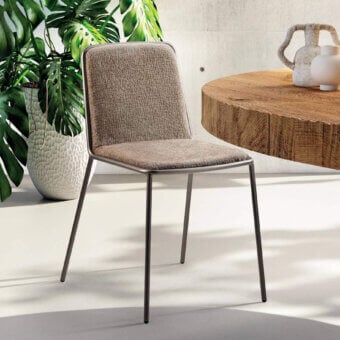 Sophisticated Lago Pletra chair with a slim dark gray metal frame and neutral brown woven textile upholstery