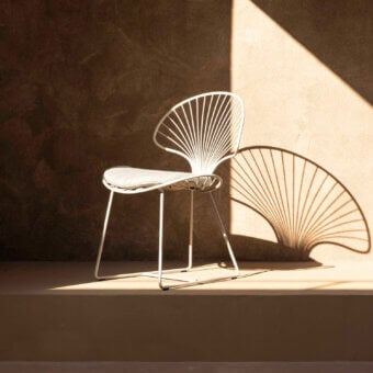 Superior Royal Botania Ostrea lounge chair crafted in coated stainless steel with a smooth white finish and textile cushion