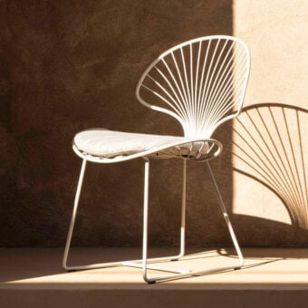 Superior Royal Botania Ostrea lounge chair crafted in coated stainless steel with a smooth white finish and textile cushion