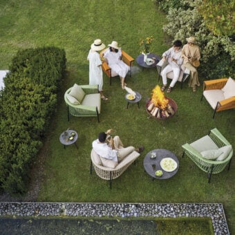 Exceptional Roberti Rattan Corolle lounge chair crafted in light green Oval Trendyrope with a powder-coated Aisi 304 stainless steel frame