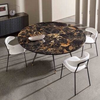 Lavish Sovet Italia Arkos XXL table with stone tabletop exhibiting black and gold marbled tones plus glossy finish
