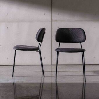 Distinguished Sovet Italia Soft chair with dark gray textile upholstery and slender matte black lacquered metal structure