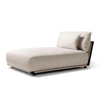 Beige chaise lounge with textured fabric upholstery, rectangular frame, square pillows, and dark cylindrical legs in a studio setting.