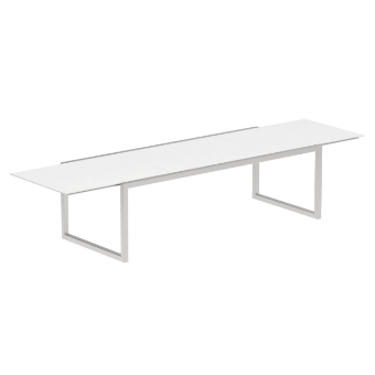 White extension table with rectangular tabletop and square metal legs, studio shot, matte finish, minimalist modern design.