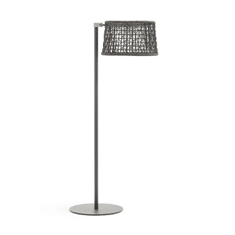 Floor lamp, dark gray metal, cylindrical base with woven square lampshade and slender stem, minimalist modern design.