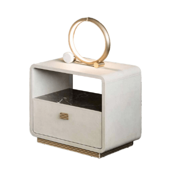 Nightstand, beige with gold trim, rectangular form, rounded edges, recessed drawer, open shelf with dark marble surface, gold bar handle.