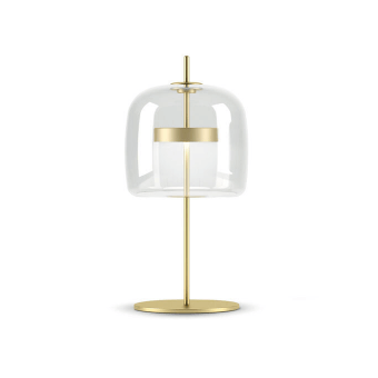 Brass table lamp with cylindrical stem, flared frosted glass shade, and white inner shade, studio product shot.