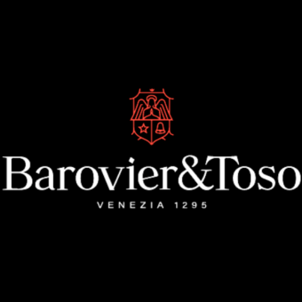 Barovier&Toso logo with red crest depicting foliage, towers, shield, and star above brand name and founding year "VENEZIA 1295" text.