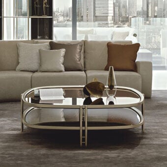 Distinguished Bizzotto Italia Ikat coffee table with reflective glass and light gold lacquered metal legs and frame