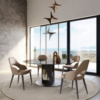 Sophisticated Bizzotto Italia Nest chair with curved light beige upholstery and ‘Canna di Fucile’ gunmetal legs crafted in Italy