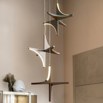 Distinguished Bizzotto Italia Papillon suspension lamp with intersecting wood elements and Ottone finish emitting soft white light