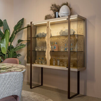 Exquisite Bizzotto Italia Sidney D'or cupboard with glass doors and sinuous light-toned wood detail built within a dark metal frame