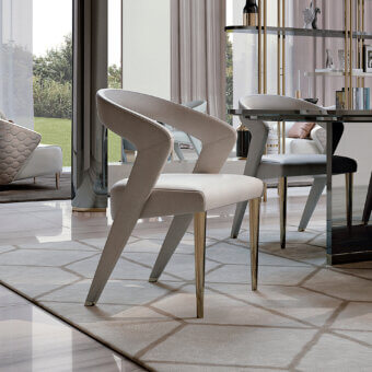 Elegant Bizzotto Italia Wave chair with captivating light-toned textile and lacquered metal front legs