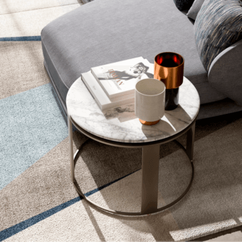 Elegant CPRN Homood Denis coffee table with light gray and white marble top and dark gray metal base