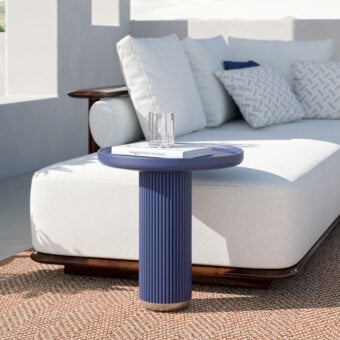 Elegant CPRN Homood Josè side table with a uniform blue tabletop and grooved cylindrical base crafted with a lacquered finish