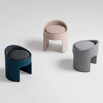 Distinguished CPRN Homood Zoe ottoman with light beige fabric and textured textile, finished with a smooth matte surface