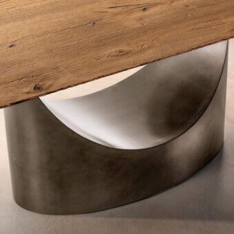 Lago rectangular table, wood tabletop with honey finish and knots, curved brushed metal base with white interior.