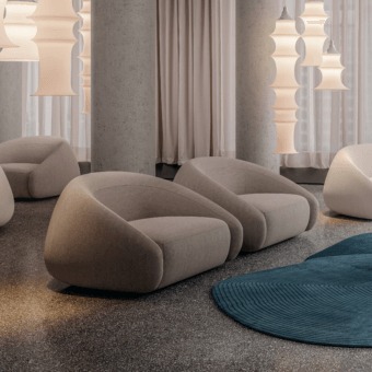 Exceptional LaCividina Apper lounge chair with unified form, matte beige textile upholstery and rounded silhouette