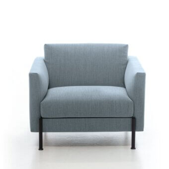 Distinguished LaCividina Newtime lounge chair with light blue textile upholstery and slim dark metal feet crafted with a matte finish