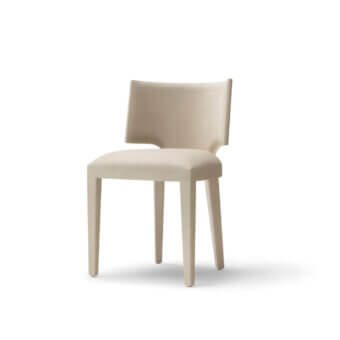 Refined OAK Nolita chair with enveloping backrest and essential leg lines in a smooth matte beige finish