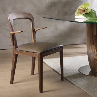 Elegant Pacini & Cappellini Gaya chair with comfortable padding in a medium brown textile and Canaletto walnut crafted with a smooth finish
