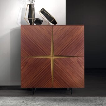 Elegant Pacini & Cappellini Milano cupboard with reddish-brown wood, brass details and graphite metal feet displaying a smooth finish