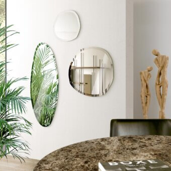 Exceptional Pacini & Cappellini Stone mirror with irregular shape and smooth finish crafted in a light-toned frame