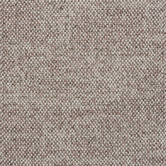 Textile sample, muted shell pink, irregular weave pattern with beige and gray threads, dense nubby texture, heathered appearance.