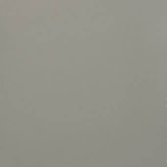 Gray fabric swatch with matte finish and tight weave, displaying a neutral cool tone and perforated edge for potential attachment.