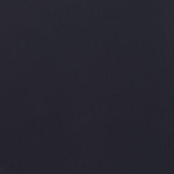 Dark navy fabric texture, matte finish, finely woven with tonal variations, uniform composition, deep charcoal hues, subtle surface imperfections.
