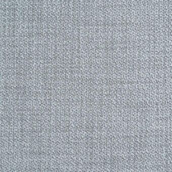 Granular gray texture composed of small, irregular particles with a matte finish, creating a speckled, rough surface for grip or decoration.