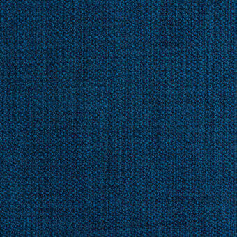 Deep blue granular texture fills the frame, displaying a consistent, pebbled pattern with subtle tonal shifts and a uniform, tactile quality.