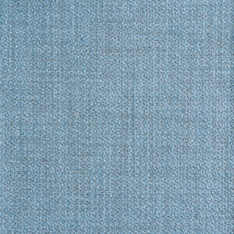 Light blue fabric texture with a dense, tight weave and heathered effect, incorporating darker gray threads for visual depth.